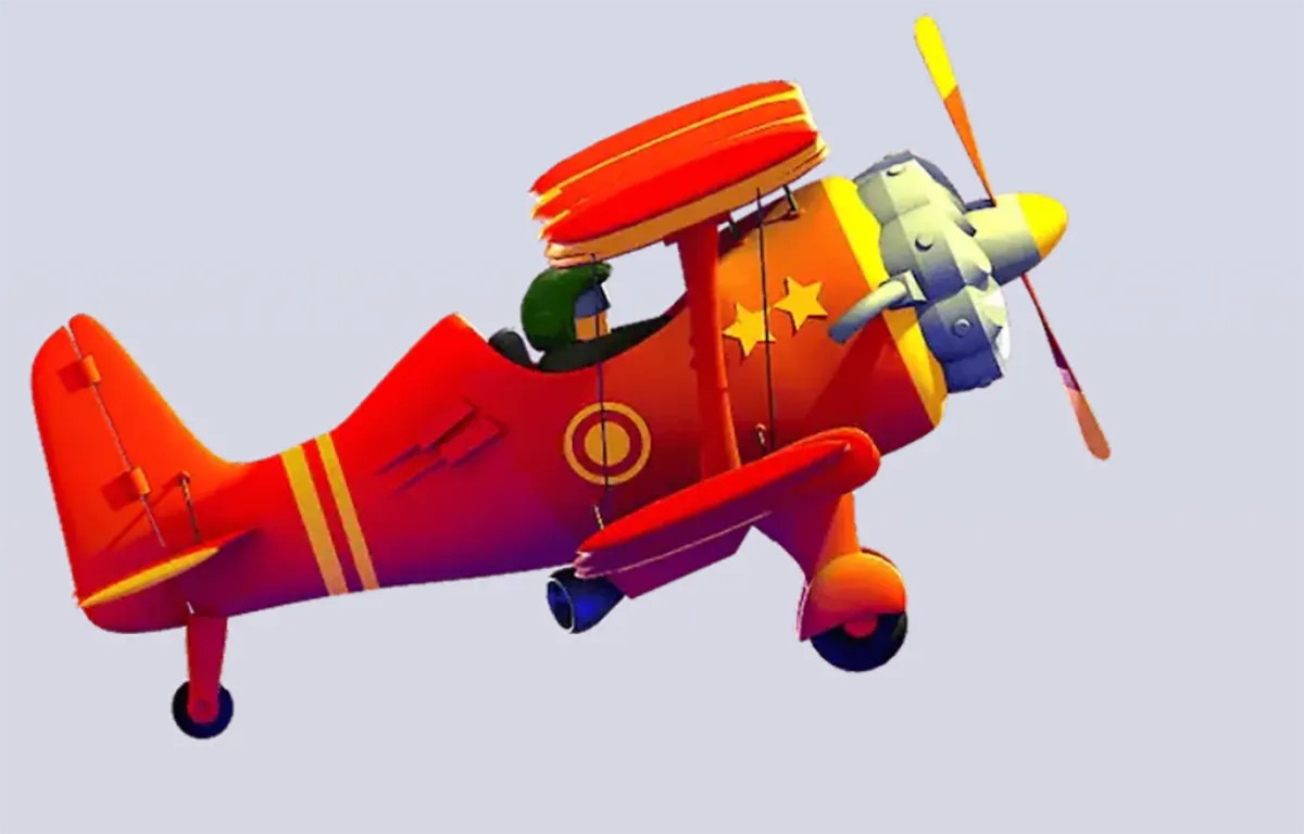 A colorful cartoon-style red airplane with a yellow and red striped design, stars on the body, and a propeller, with a pilot visible inside the cockpit.
